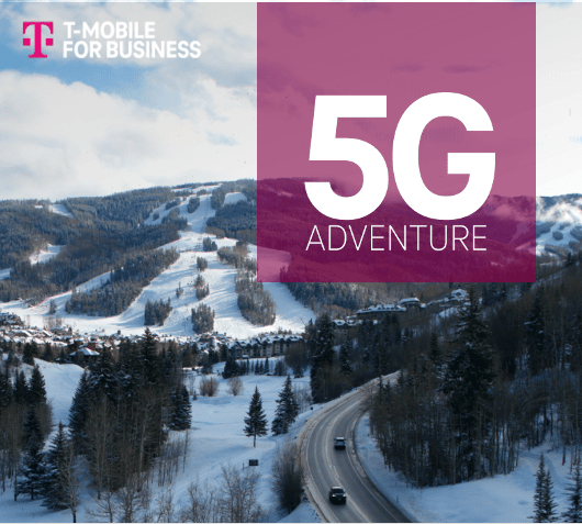 Stylized blue and pink image of a whiskey glass with the wordmark of Vèloce in pink all-caps letters above.